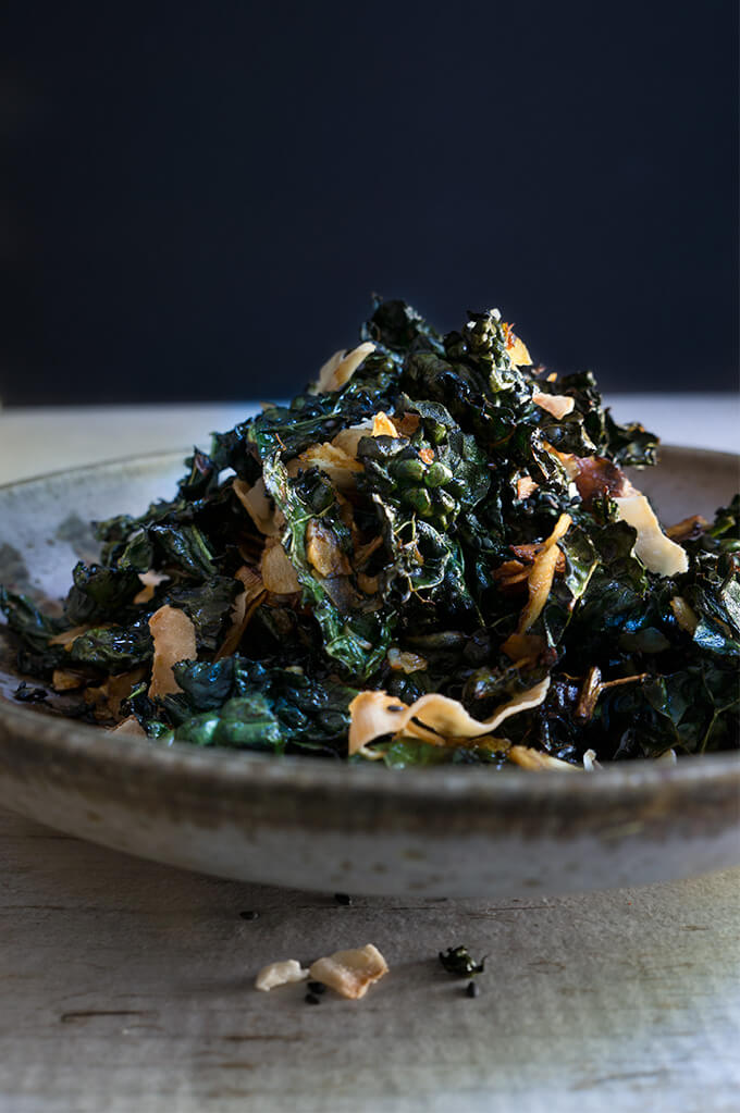 Kale salad with toasted coconut and sesame oil - this fantastic salad from Heidi Swanson has it all - it's crunchy, it's salty, it's satisfying, and feels like comfort food, yet is a health bomb. | www.viktoriastable.com