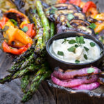Marinated grilled vegetables with whipped goat cheese - eggplants, peppers, zucchini, asparagus, and onions, marinated and grilled till soft on the inside and charred on the outside, then doused in garlicky marinade, and served with whipped goat cheese on the side. | www.viktoriastable.com