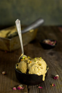 Pistachio rose ice cream - rich, creamy and outrageously delicious, spiked with rose water and cardamom, it's the strongest pistachio flavored ice cream I've tasted, and you can easily make it at home! | www.viktoriastable.com