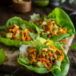Spiced ground turkey lettuce wraps - a quick and healthy weeknight meal, one of our top favorites, these wraps are loaded with veggies, and warm spices, and topped with crunchy peanuts, fresh cilantro and creamy avocado. | www.viktoriastable.com