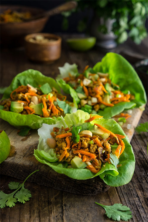 Spiced ground turkey lettuce wraps - a quick and healthy weeknight meal, one of our top favorites, these wraps are loaded with veggies, and warm spices, and topped with crunchy peanuts, fresh cilantro and creamy avocado. | www.viktoriastable.com