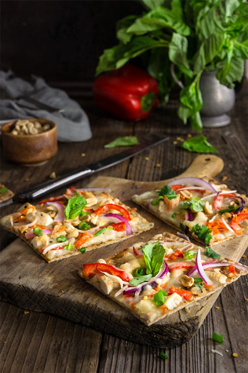 Thai chicken pizza - loaded with toppings, and bursting with bright flavors. | www.viktoriastable.com