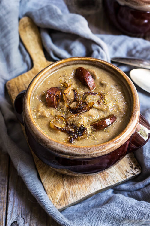 Caramelized onion, lentils and mushroom soup - creamy, hearty and decadent soup, topped with smoked sausage and fennel pollen for an irresistible depth of flavors. | www.viktoriastable.com