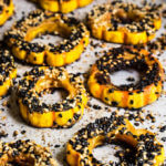 Sesame-roasted, maple chipotle delicata squash - crunchy sesame crust, sweet and spicy soft interior, fun looking, and so freakishly delicious, it's scary - these are your perfect Halloween treat! | www.viktoriastable.com