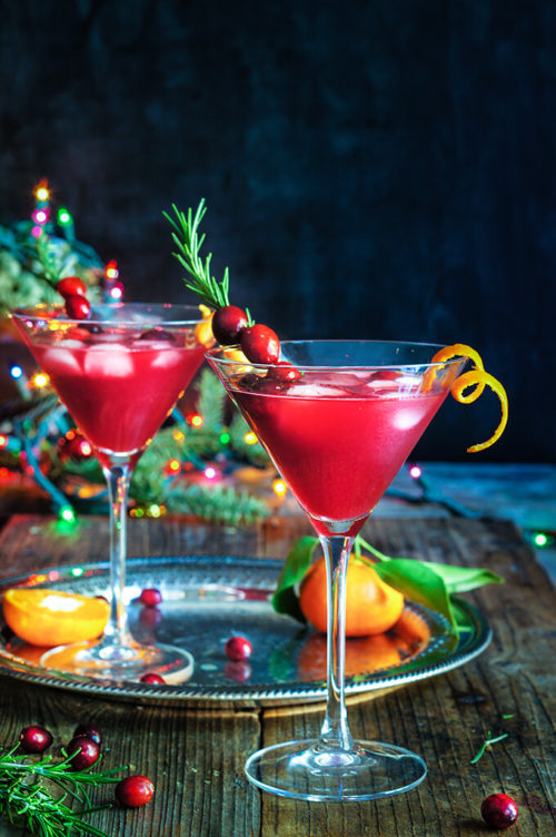 Cranberry rosemary citrus martini - bring on the holiday spirit by shaking up these bright and cheerful, rosemary infused, citrus martinis. | www.viktoriastable.com