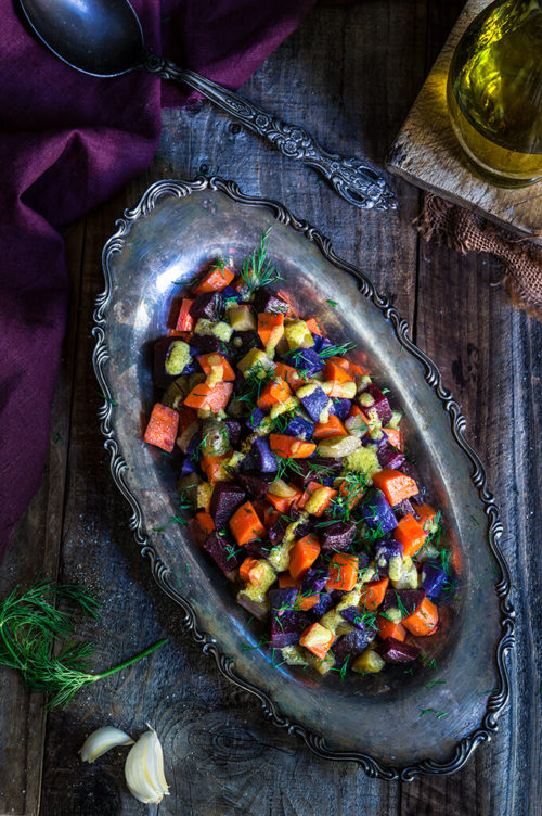 Beet and carrot salad with mustard garlic vinaigrette - boiled root veggies, crunchy pickles and lots of fresh dill drizzled with a lovely mustard garlic dressing - a fantastic winter salad that's easy on the calories, yet filling and satisfying. | www.viktoriastable.com