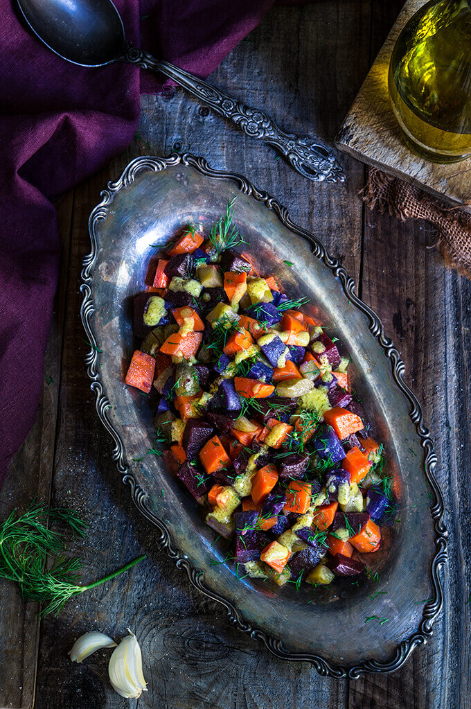Beet and carrot salad with mustard garlic vinaigrette - boiled root veggies, crunchy pickles and lots of fresh dill drizzled with a lovely mustard garlick dressing - a fantastic winter salad that's easy on the calories, yet filling and satisfying. | www.viktoriastable.com 