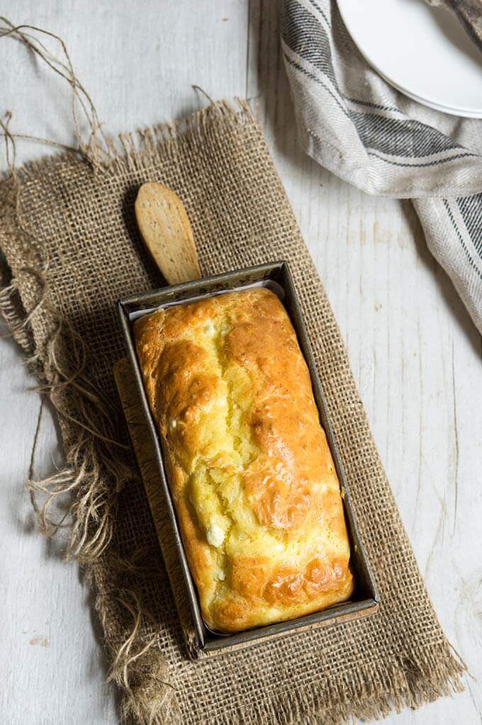 Feta cheese quick bread - fluffy, moist and buttery, this savory quick bread recipe is ideal for breakfast, snack or even dinner.