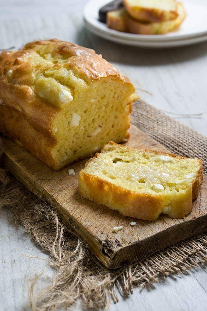 Feta cheese quick bread - fluffy, moist and buttery, this savory quick bread recipe is ideal for breakfast, snack or even dinner.