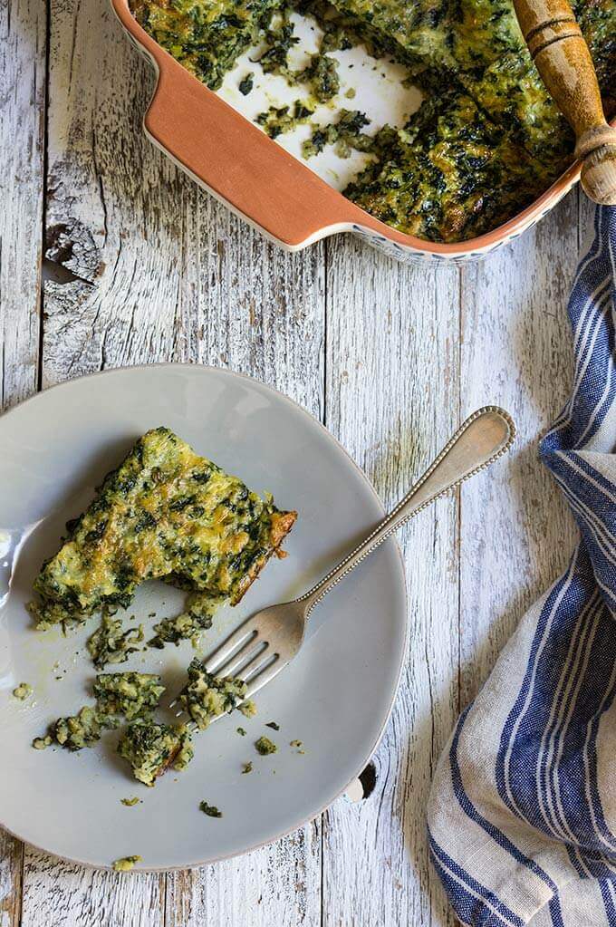 Smoky spinach rice casserole - this family favorite recipe is full of greens, yet tastes like comfort food, and will convert even picky eaters to spinach lovers. | ww.viktoriastable.com