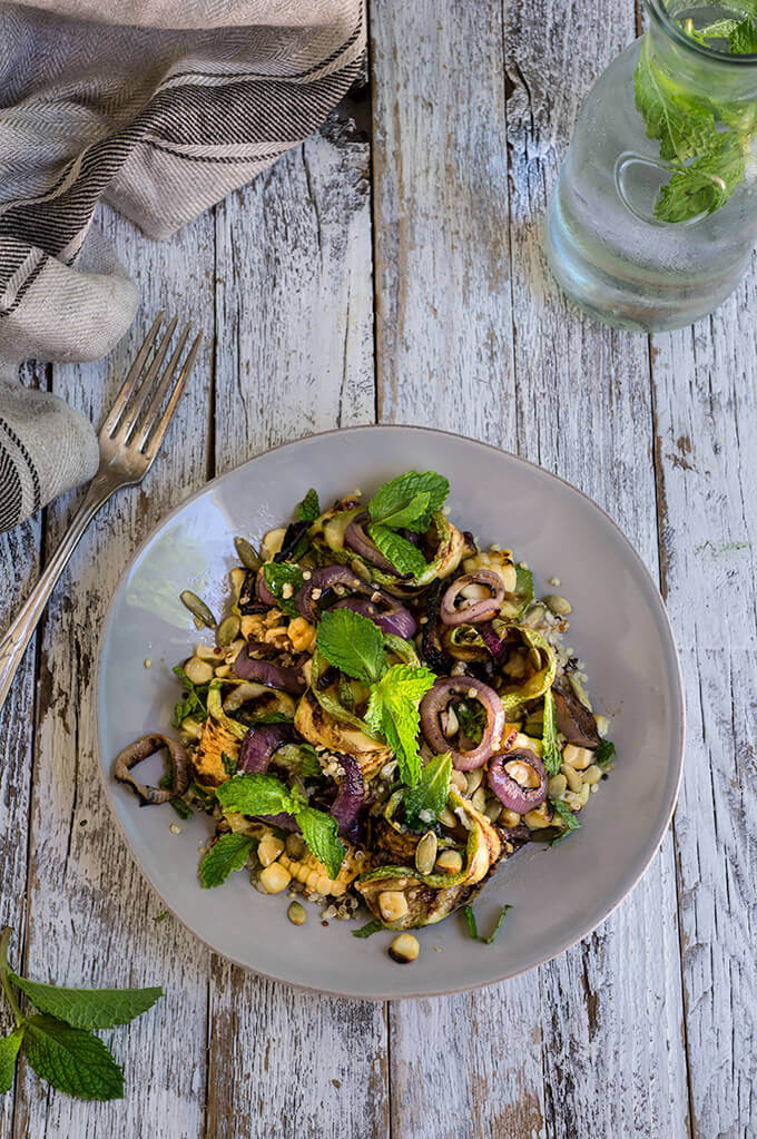 Grilled zucchini and corn quinoa salad - loaded with sweet, grilled summer veggies, healthy quinoa and crunchy toasted pepitas, and bursting with fresh, citrus and mint flavors - so bright, delicious and filling. | www.viktoriastable.com