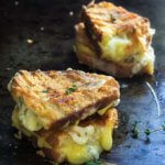 Garlic and herb loaded grilled cheese sandwich - four different cheeses, flavored with garlic and thyme, come into play, to create the ultimate, grilled cheese lover's dream sandwich. | www.viktoriastable.com