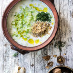 Cold cucumber yogurt soup - garlic, walnuts, dill, fresh cucumbers and chilled yogurt make this soup super delicious and quite refreshing on a hot day. | www.viktoriastable.com