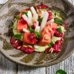 Watermelon jicama mint salad - it's a mouthwatering combination of contrasting flavors and textures - creamy, and crunchy, sweet and tart, but most of all delicious and refreshing! | www.viktoriastable.com
