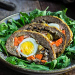 Stuffed meatloaf - flavorful juicy meat, stuffed with mushrooms, ham, smoked cheese, boiled eggs, carrots and pickles - this is one fancy meal, perfect for a special occasion, or holiday.| www.viktoriastable.com