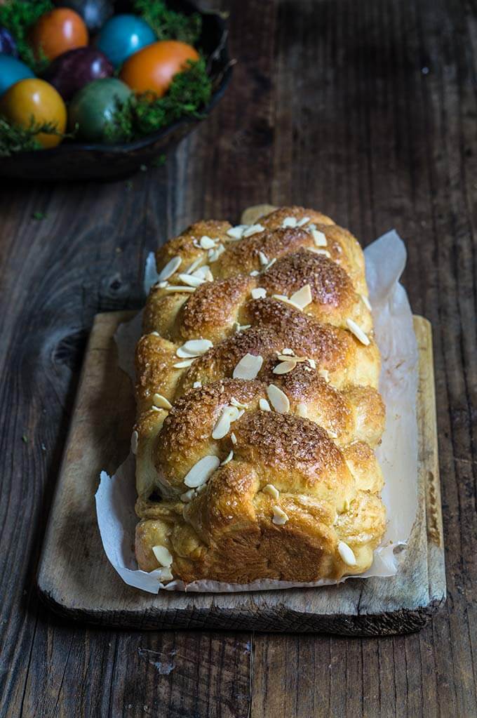 Bulgarian Easter bread - kozunak is a cotton-soft, sugar-crusted sweet bread, studded with rum-soaked raisins, and perfumed with vanilla and lemon zest - the ultimate Easter treat. | www.viktoriastable.com