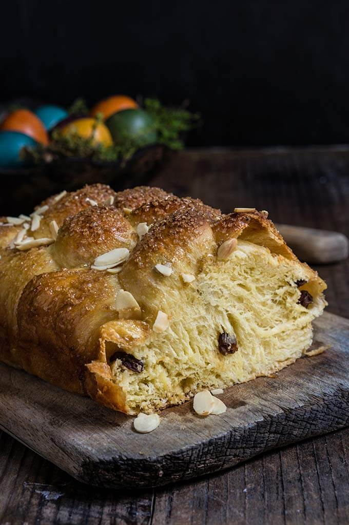 Bulgarian Easter bread - kozunak is a cotton-soft, sugar-crusted sweet bread, studded with rum-soaked raisins, and perfumed with vanilla and lemon zest - the ultimate Easter treat. | www.viktoriastable.com