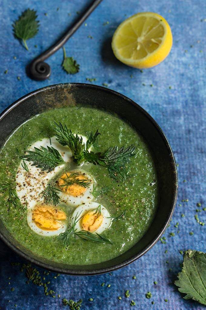 Nettle and green garlic soup - this creamy soup tastes like the spring, with flavors of mild garlic, aromatic dill, and fresh lemon, and is packed with cleansing nutrients and minerals. | www.viktoriastable.com