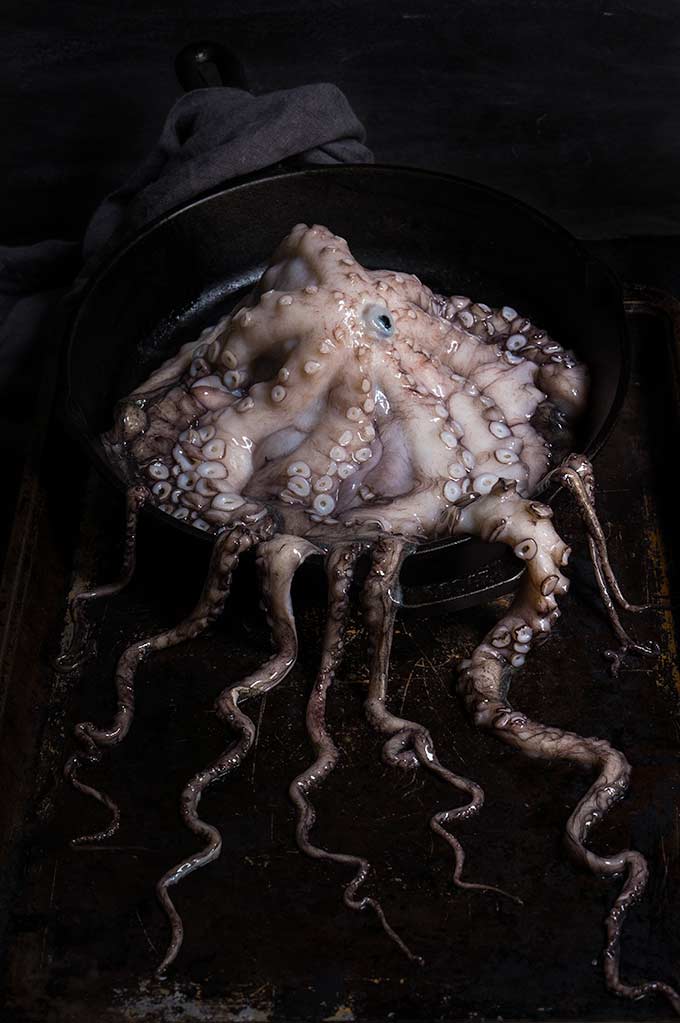 Grilled octopus over squid ink pasta and tomato garlic sauce - Viktoria ...